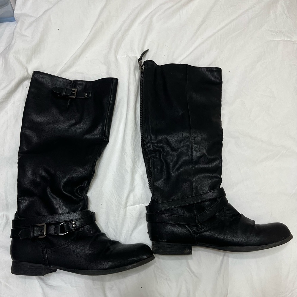 Below the knee black boots